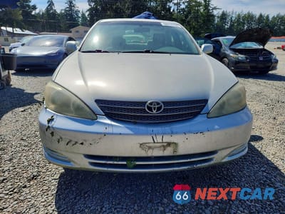 Piąte zdjęcie samochodu w środku: 2000 TOYOTA CAMRY LE VIN:4T1BE32K13U238099 - miniatura