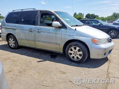 Czwarte zdjęcie samochodu z boku: 2003 HONDA ODYSSEY EXL VIN:5FNRL18043B138039 - miniatura