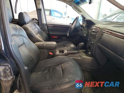 Zdjęcie 7 z 13 samochodu: 2003 JEEP GRAND CHEROKEE LIMITED VIN:1J4GW58N83C546746 - miniatura