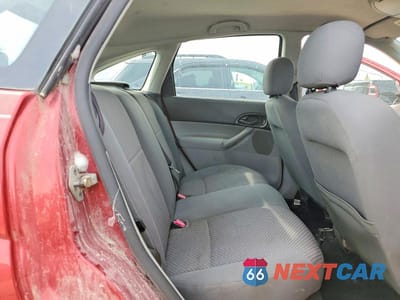 Zdjęcie 10 z 12 samochodu: 2005 FORD FOCUS ZX5 VIN:3FAFP37N35R148679 - miniatura