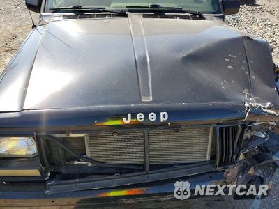 Zdjęcie 12 z 13 samochodu: 1996 JEEP CHEROKEE SPORT VIN:1J4FJ68S9TL139427 - miniatura