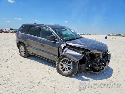 Czwarte zdjęcie samochodu z boku: 2019 JEEP GRAND CHEROKEE LAREDO VIN:1C4RJFAG6KC636524 - miniatura