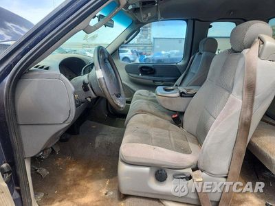 Zdjęcie 7 z 12 samochodu: 2002 FORD F150 VIN:1FTRX17282KD15135 - miniatura