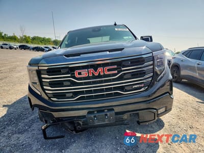 Piąte zdjęcie samochodu w środku: 2022 GMC SIERRA K1500 AT4 VIN:1GTPUEEL4NZ609176 - miniatura