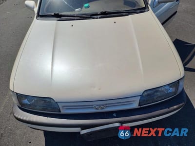 Zdjęcie 11 z 12 samochodu: 1993 INFINITI G20 BASE VIN:JNKCP01P1PT403982 - miniatura
