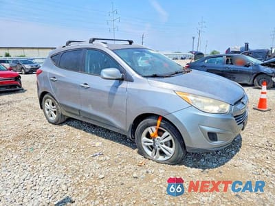 Czwarte zdjęcie samochodu z boku: 2010 HYUNDAI TUCSON GLS VIN:KM8JU3AC5AU091968 - miniatura