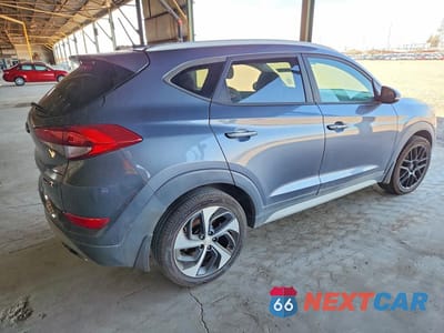 Trzecie zdjęcie samochodu z tyłu: 2017 HYUNDAI TUCSON VIN:KM8J33A24HU524295 - miniatura