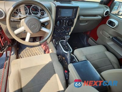 Zdjęcie 8 z 13 samochodu: 2008 JEEP WRANGLER UNLIMITED SAHARA VIN:1J8GA59188L614334 - miniatura