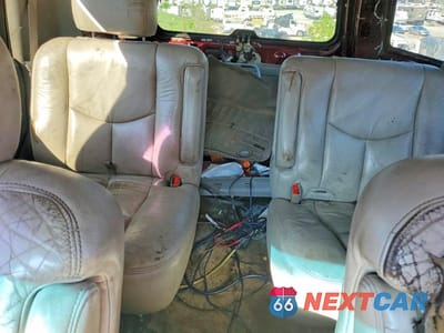 Zdjęcie 10 z 13 samochodu: 2002 CHEVROLET TAHOE C1500 VIN:1GNEC13VX2R216583 - miniatura