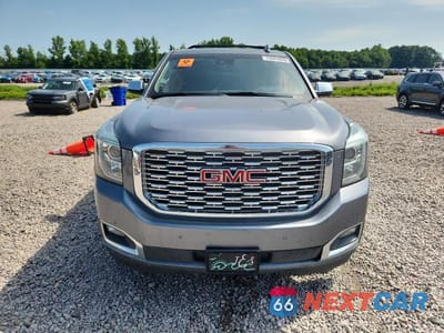 Piąte zdjęcie samochodu w środku: 2019 GMC YUKON SLT VIN:1GKS2BKC6KR350712 - miniatura