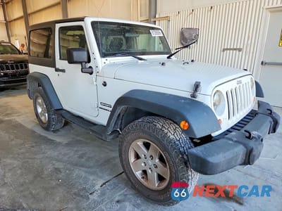 Czwarte zdjęcie samochodu z boku: 2012 JEEP WRANGLER SPORT VIN:1C4GJWAG3CL259210 - miniatura