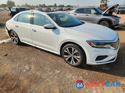 Czwarte zdjęcie samochodu z boku: 2021 VOLKSWAGEN PASSAT SE VIN:1VWSA7A33MC003029 - miniatura