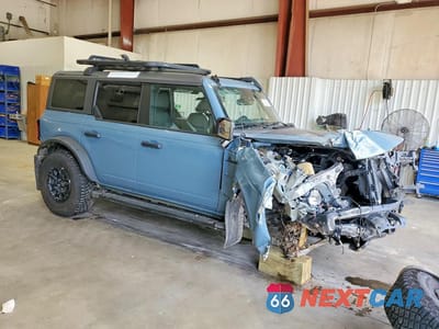 Czwarte zdjęcie samochodu z boku: 2022 FORD BRONCO BASE VIN:1FMEE5DP2NLB32111 - miniatura