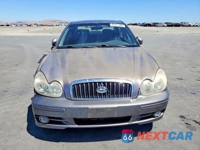Piąte zdjęcie samochodu w środku: 2002 HYUNDAI SONATA GL VIN:KMHWF25S12A570807 - miniatura