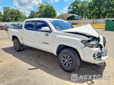 Czwarte zdjęcie samochodu z boku: 2023 TOYOTA TACOMA SR5 V6 VIN:3TMCZ5AN7PM572314 - miniatura