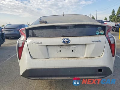 Zdjęcie 6 z 12 samochodu: 2018 TOYOTA PRIUS TWO VIN:JTDKBRFU3J3590860 - miniatura