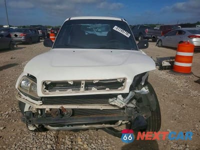Piąte zdjęcie samochodu w środku: 1999 TOYOTA RAV4 BASE VIN:JT3GP10V1X0035107 - miniatura