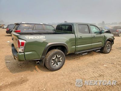 Trzecie zdjęcie samochodu z tyłu: 2021 TOYOTA TACOMA TRD OFF-ROAD VIN:3TMDZ5BNXMM117827 - miniatura