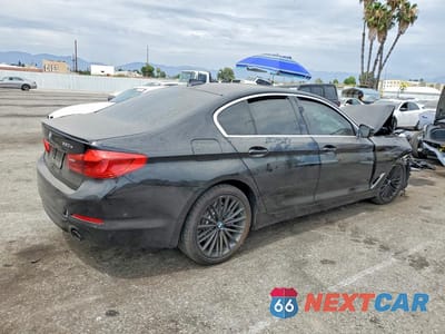 Trzecie zdjęcie samochodu z tyłu: 2020 BMW 530E VIN:WBAJA9C01LCE61874 - miniatura
