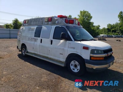 Czwarte zdjęcie samochodu z boku: 2009 CHEVROLET EXPRESS G3500 VIN:1GBHG396291144295 - miniatura