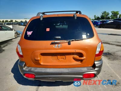 Zdjęcie 6 z 13 samochodu: 2002 HYUNDAI SANTA FE GLS VIN:KM8SC13D72U204399 - miniatura