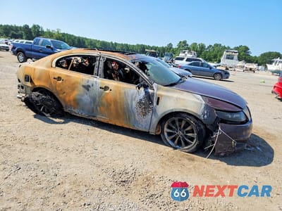 Czwarte zdjęcie samochodu z boku: 2011 LINCOLN MKS VIN:1LNHL9FT9BG611294 - miniatura