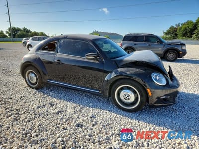 Czwarte zdjęcie samochodu z boku: 2016 VOLKSWAGEN BEETLE 1.8T VIN:3VWF17AT9GM635537 - miniatura