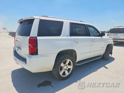 Trzecie zdjęcie samochodu z tyłu: 2016 CHEVROLET TAHOE C1500 LTZ VIN:1GNSCCKC0GR108527 - miniatura