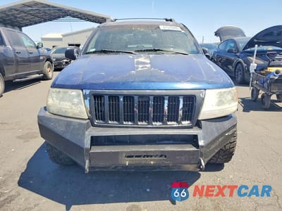 Piąte zdjęcie samochodu w środku: 2000 JEEP GRAND CHEROKEE LAREDO VIN:1J4GW48S1YC195685 - miniatura