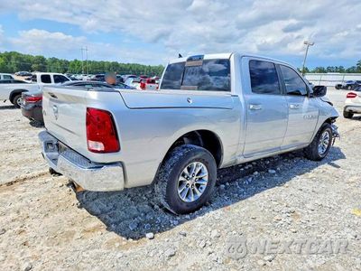 Trzecie zdjęcie samochodu z tyłu: 2014 RAM 1500 SLT VIN:1C6RR6LT2ES160017 - miniatura