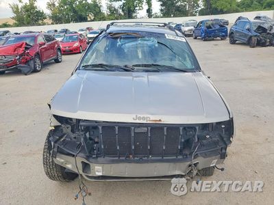 Piąte zdjęcie samochodu w środku: 2001 JEEP GRAND CHEROKEE LAREDO VIN:1J4GW48S21C613578 - miniatura