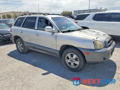 Czwarte zdjęcie samochodu z boku: 2005 HYUNDAI SANTA FE GLS VIN:KM8SC13EX5U901580 - miniatura