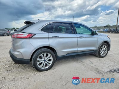 Trzecie zdjęcie samochodu z tyłu: 2022 FORD EDGE TITANIUM VIN:2FMPK4K98NBA39416 - miniatura