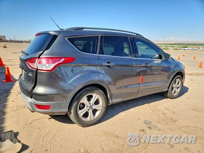 Trzecie zdjęcie samochodu z tyłu: 2016 FORD ESCAPE SE VIN:1FMCU9G96GUB98611 - miniatura