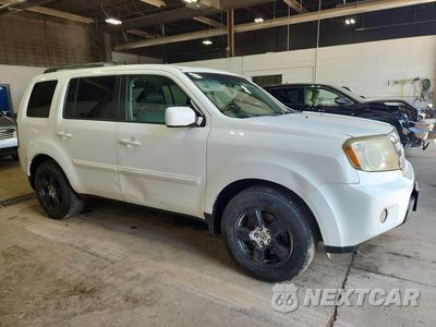 Czwarte zdjęcie samochodu z boku: 2009 HONDA PILOT EXL VIN:5FNYF48639B039357 - miniatura