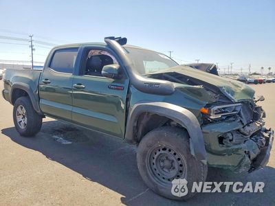 Czwarte zdjęcie samochodu z boku: 2020 TOYOTA TACOMA SR V6 VIN:5TFCZ5ANXLX215715 - miniatura