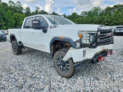 Czwarte zdjęcie samochodu z boku: 2021 GMC SIERRA K2500 AT4 VIN:1GT49PEY9MF239578 - miniatura