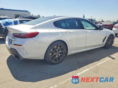 Trzecie zdjęcie samochodu z tyłu: 2020 BMW M850XI VIN:WBAGV8C0XLBP48612 - miniatura