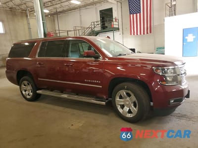 Czwarte zdjęcie samochodu z boku: 2019 CHEVROLET SUBURBAN K1500 LT VIN:1GNSKHKC3KR297327 - miniatura
