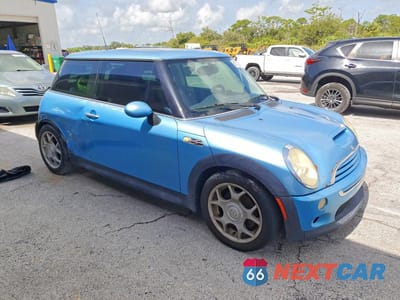 Czwarte zdjęcie samochodu z boku: 2005 MINI COOPER S VIN:WMWRE33565TL14014 - miniatura