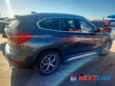 Trzecie zdjęcie samochodu z tyłu: 2017 BMW X1 SDRIVE28I VIN:WBXHU7C37H5H36864 - miniatura