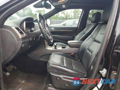 Zdjęcie 7 z 13 samochodu: 2015 JEEP GRAND CHEROKEE SUMMIT VIN:1C4RJEJGXFC118948 - miniatura
