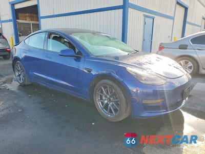 Czwarte zdjęcie samochodu z boku: 2022 TESLA MODEL 3 VIN:5YJ3E1EA6NF288475 - miniatura