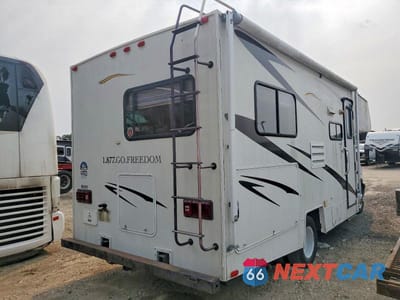 Czwarte zdjęcie samochodu z boku: 2007 CHEVROLET EXPRESS RV VIN:1GBJG31U171183551 - miniatura