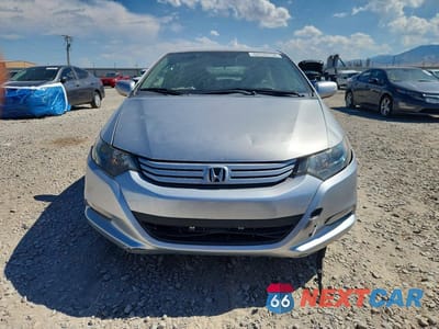 Piąte zdjęcie samochodu w środku: 2010 HONDA INSIGHT EX VIN:JHMZE2H76AS009702 - miniatura