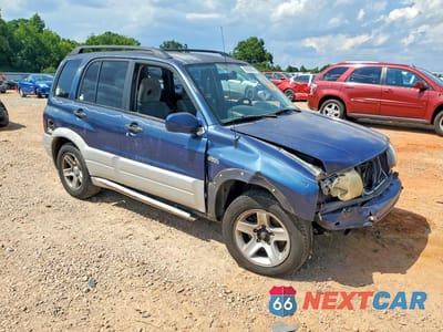 Czwarte zdjęcie samochodu z boku: 2003 SUZUKI GRAND VITARA JLX LIMITED VIN:JS3TD62V734104058 - miniatura