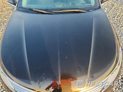 Zdjęcie 11 z 12 samochodu: 2016 LINCOLN MKZ VIN:3LN6L2JK7GR634344 - miniatura