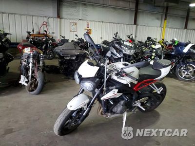 Trzecie zdjęcie samochodu z tyłu: 2018 TRIUMPH MOTORCYCLE STREET TRIPLE R VIN:SMTA414D3JT834907 - miniatura