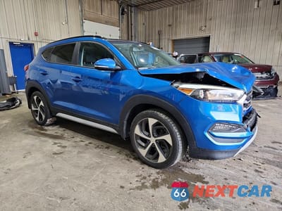 Czwarte zdjęcie samochodu z boku: 2018 HYUNDAI TUCSON VALUE VIN:KM8J3CA28JU833516 - miniatura