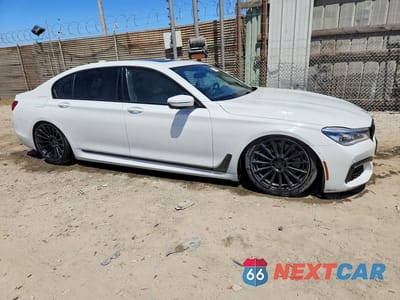 Czwarte zdjęcie samochodu z boku: 2016 BMW 750 XI VIN:WBA7F2C57GG417114 - miniatura